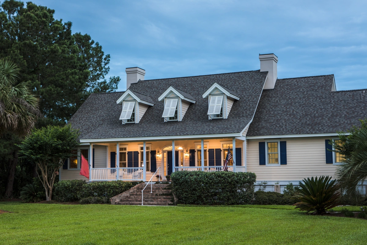 beautiful home exterior with a shingle roof