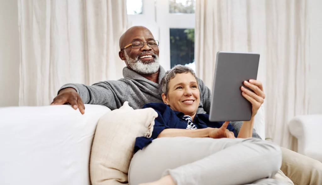 elder couple smiling together in their home in Brandon, FL