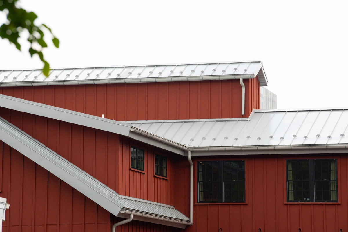 red house with a metal roof