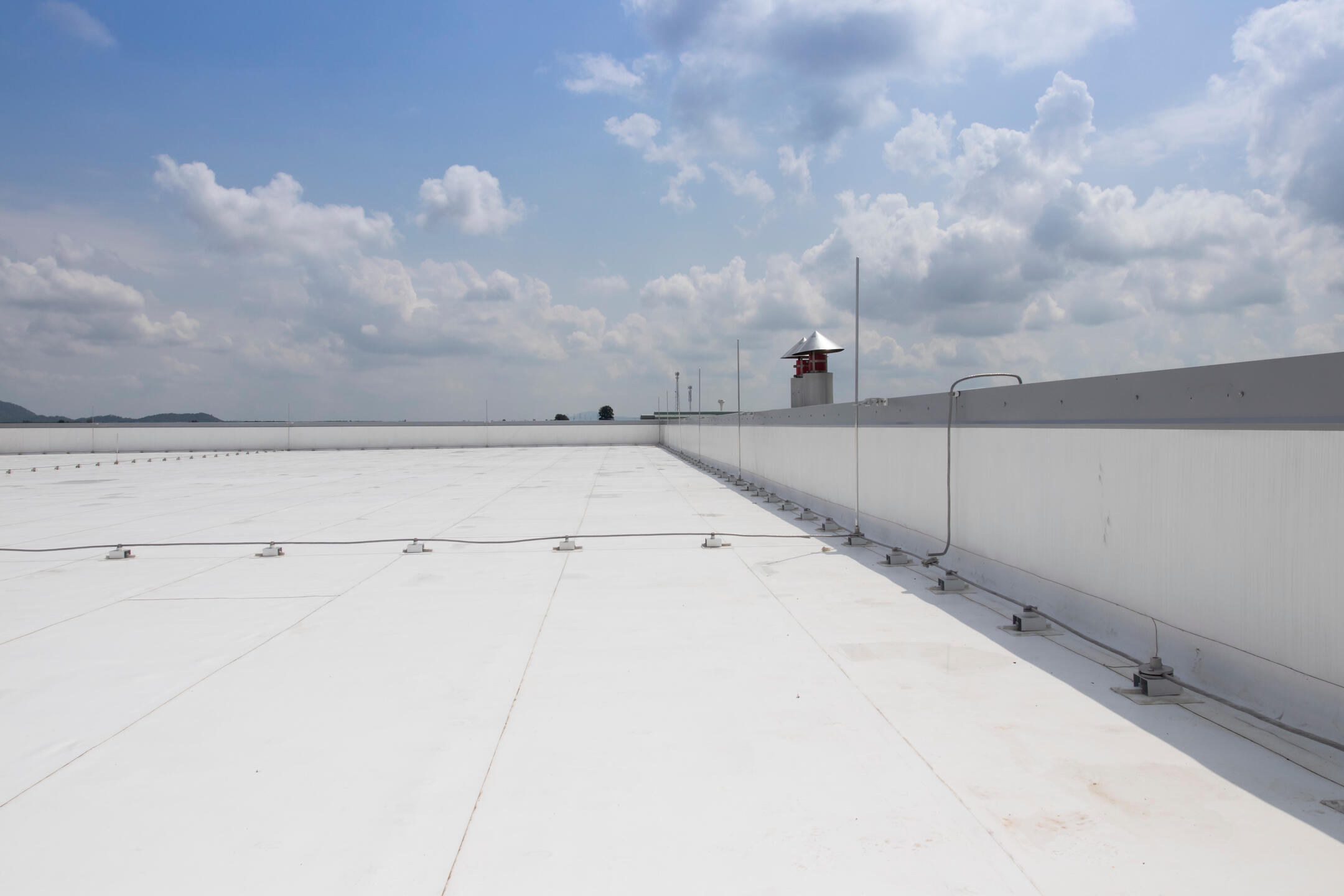 pvc roofing-commercial building with white roofing materials