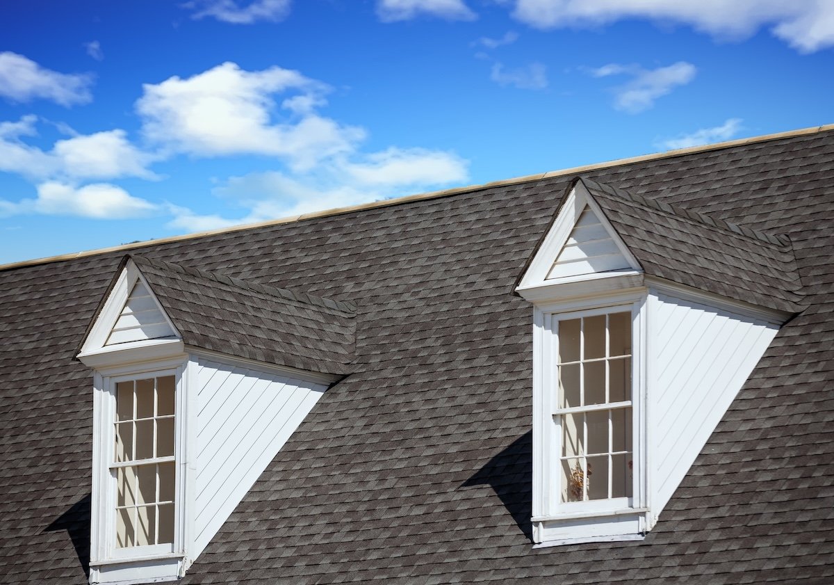 Two White Dormers on Grey Shingle Roof