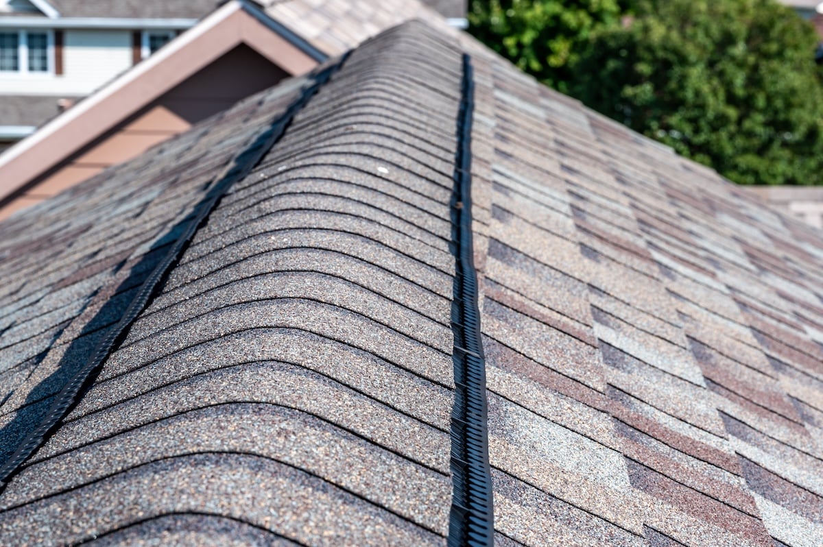 typical Ridge cap vent installed on a shingle roof for passive attic ventilation